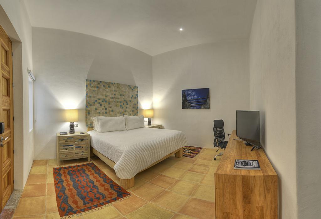 卡萨雷纳精品酒店 普埃布拉 外观 照片 A bedroom at the hotel