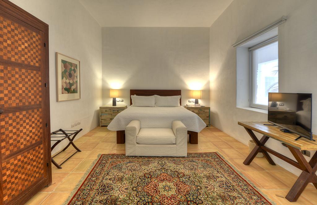 卡萨雷纳精品酒店 普埃布拉 外观 照片 A bedroom at the hotel
