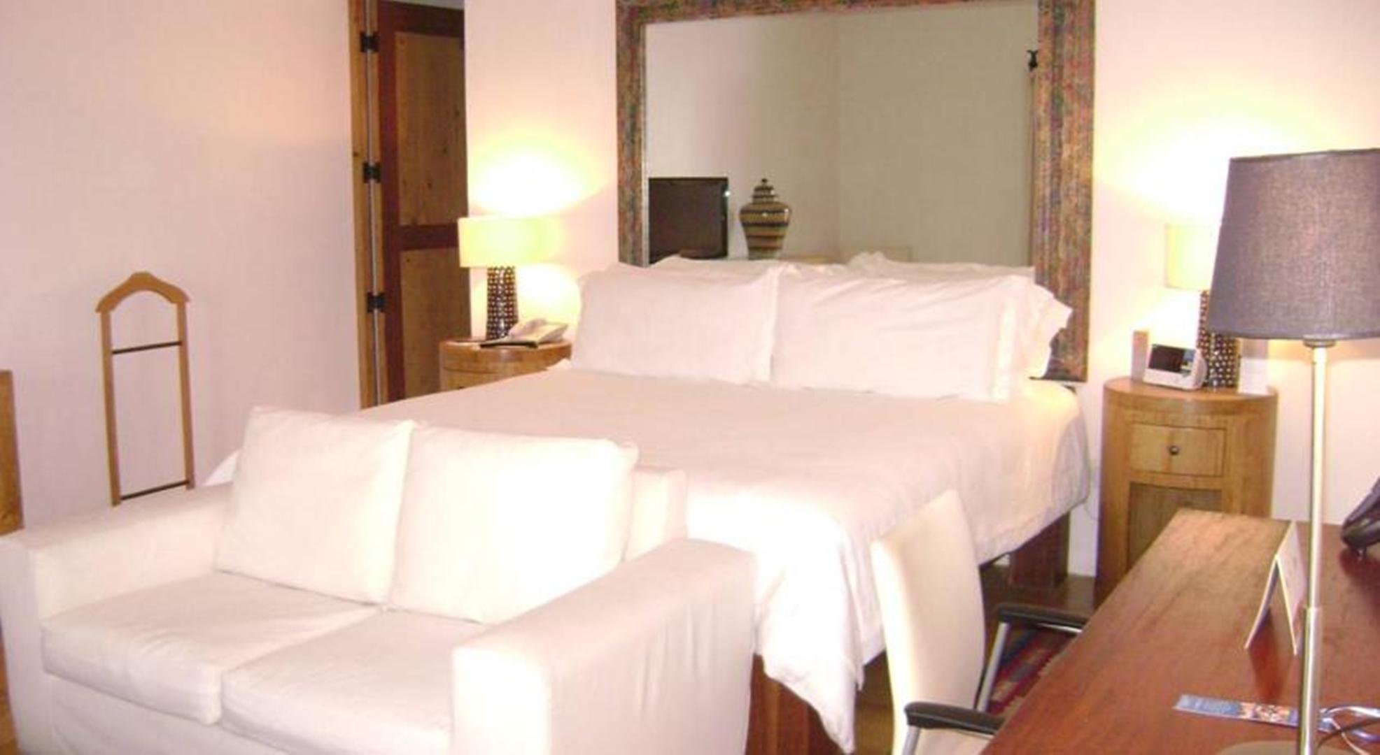 卡萨雷纳精品酒店 普埃布拉 客房 照片 A bedroom at the Inn at the Opera