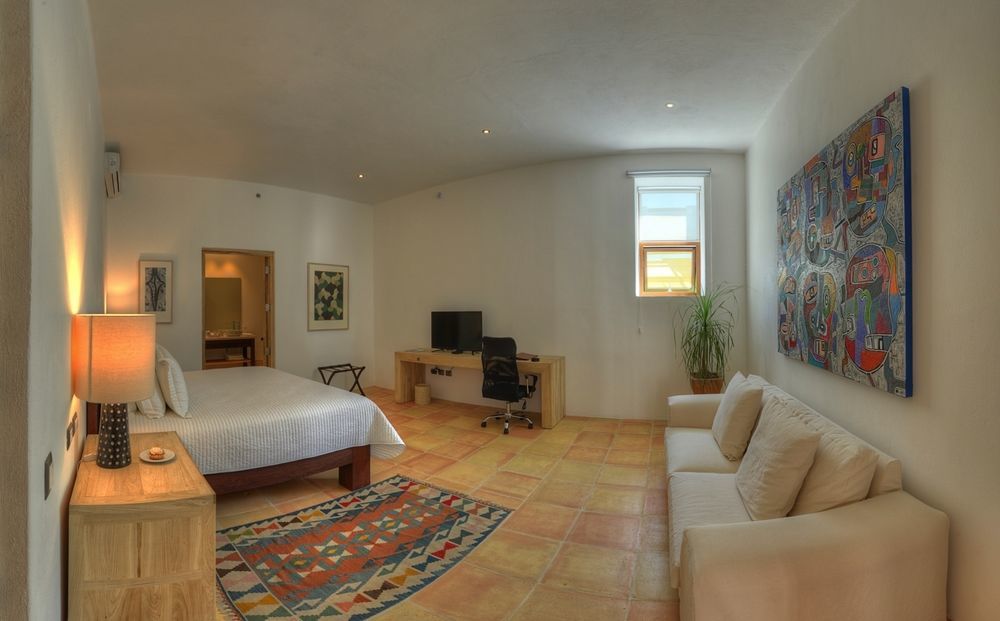 卡萨雷纳精品酒店 普埃布拉 外观 照片 A bedroom at the Inn at the Opera