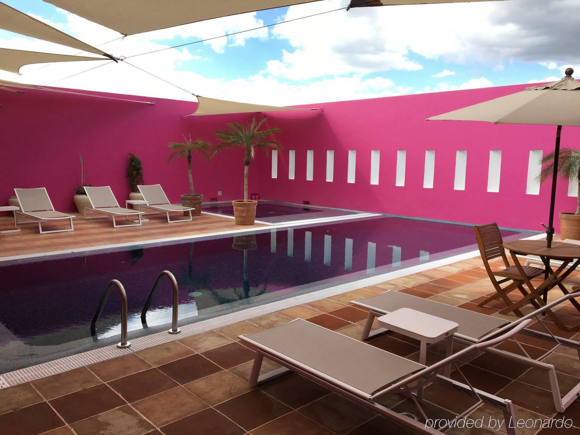 卡萨雷纳精品酒店 普埃布拉 外观 照片 Rooftop pool at Hotel Icon